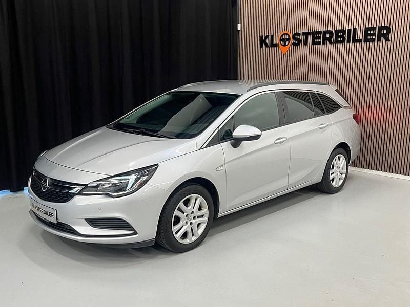 Sølvmetal Brugt 2019 Opel Astra Enjoy Stationcar | 109.700 kr. (Fair pris) - Billede 1/4
