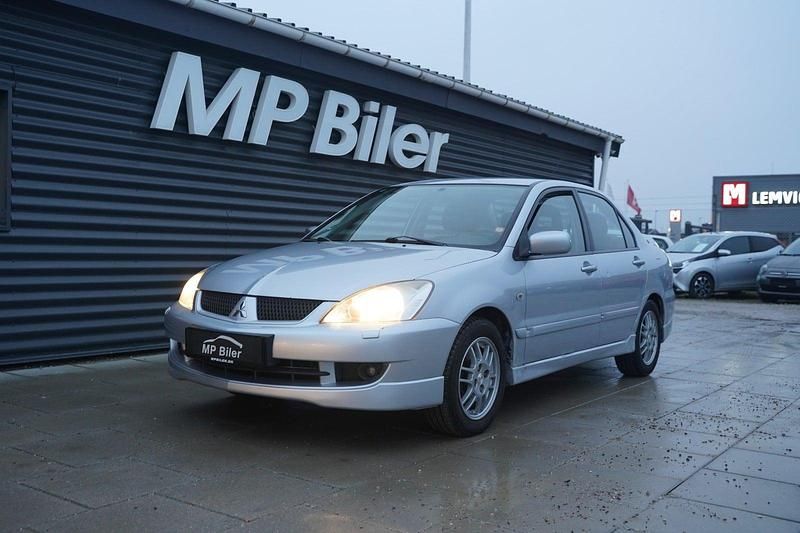 Sølvmetal Brugt 2006 Mitsubishi Lancer Invite Sedan | 12.500 kr. - Billede 1/4