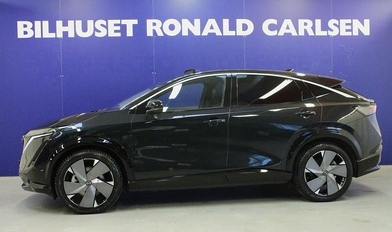 Mørkgrønmetal Brugt 2024 Nissan Ariya Evolve SUV | 319.900 kr. (Fair pris) - Billede 1/4