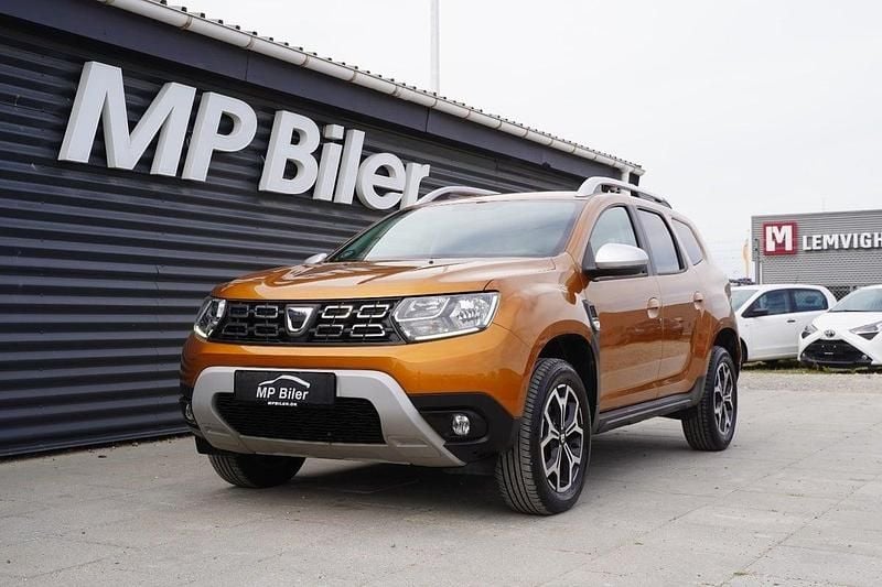 Bronzemetal Brugt 2020 Dacia Duster Prestige SUV | 139.900 kr. (Lidt for dyr) - Billede 1/4