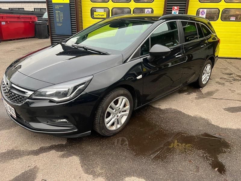 Sortmetal Brugt 2017 Opel Astra Enjoy Stationcar | 89.990 kr. (Dyr) - Billede 1/4