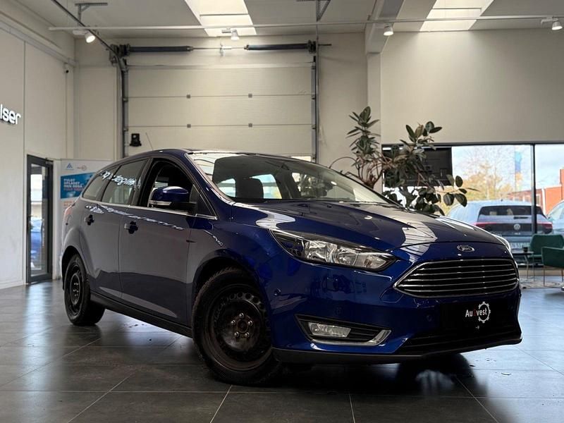 Mørkblåmetal Brugt 2015 Ford Focus Titanium Stationcar | 67.799 kr. (Fair pris) - Billede 1/4