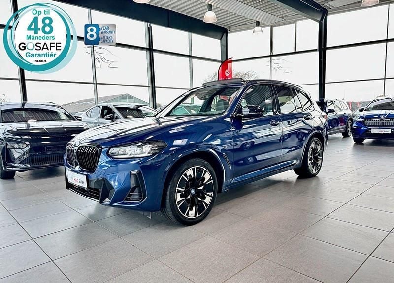 Blåmetal Brugt 2024 BMW iX3 M Sport SUV | 419.700 kr. (Super pris) - Billede 1/4