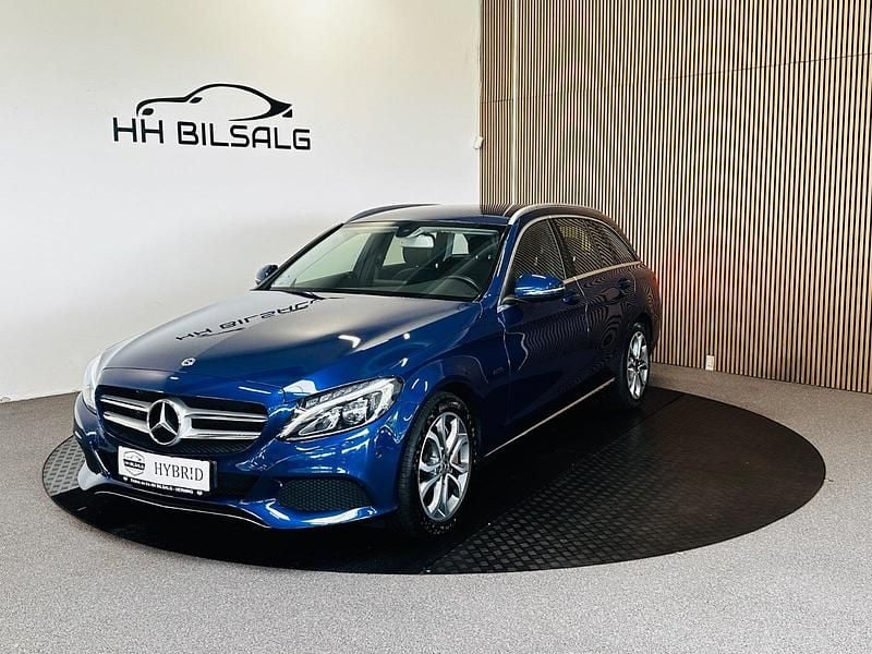Blåmetal Brugt 2018 Mercedes C350e AMG line Stationcar | 239.700 kr. - Billede 1/4