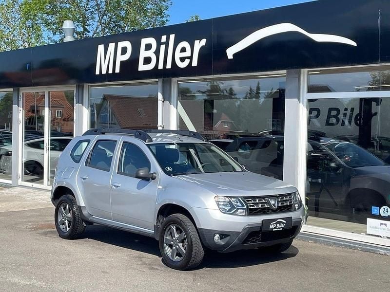 Sølvmetal Brugt 2015 Dacia Duster Lauréate SUV | 89.900 kr. (Fair pris) - Billede 1/4