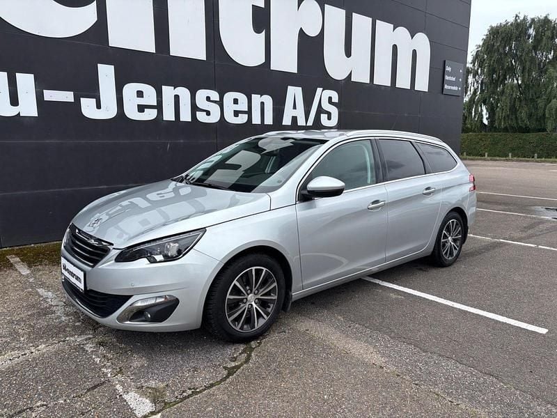 Sølvmetal Brugt 2015 Peugeot 308 Allure Stationcar | 129.900 kr. - Billede 1/4