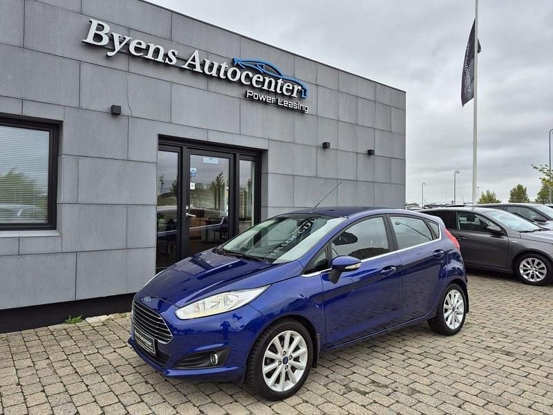 Blåmetal Brugt 2016 Ford Fiesta Titanium Hatchback | 78.500 kr. (Lidt for dyr) - Billede 1/4