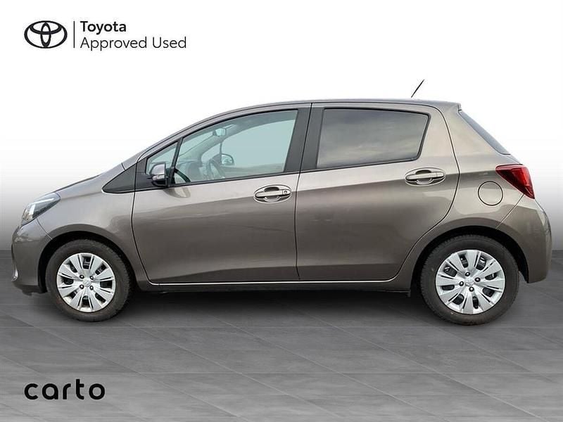 Brugt Toyota Yaris Style 69 HK (50 kW) 2016 1g2 platinum bronze Hatchback