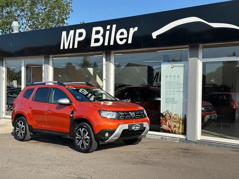 Bronzemetal Brugt 2021 Dacia Duster Prestige SUV | 189.900 kr. - Billede 1/4