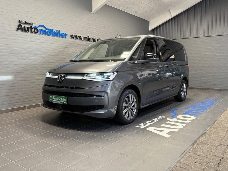 Gråmetal Brugt 2023 VW Multivan Style MPV | 599.900 kr. (Dyr) - Billede 1/4