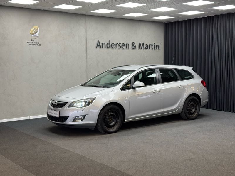 Sovereign silver, metallic Brugt 2012 Opel Astra Enjoy Stationcar | 74.900 kr. - Billede 1/4