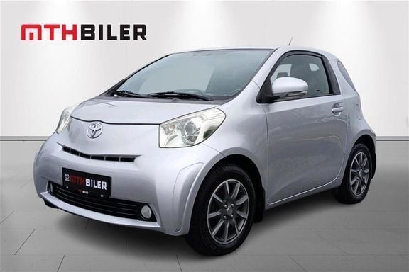 1f7 silver Brugt 2011 Toyota iQ Hatchback | 59.900 kr. - Billede 1/4