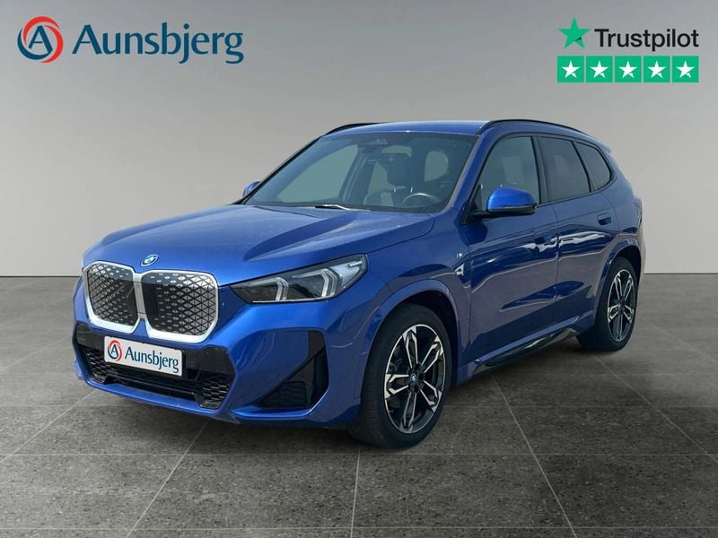 Blue metallic Brugt 2024 BMW iX1 M Sport SUV | 344.500 kr. (Lidt for dyr) - Billede 1/4