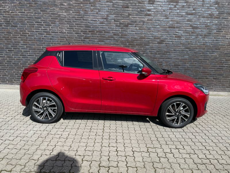 Brugt Suzuki Swift Exclusive 83 HK (61 kW) 2024 Burning red Hatchback