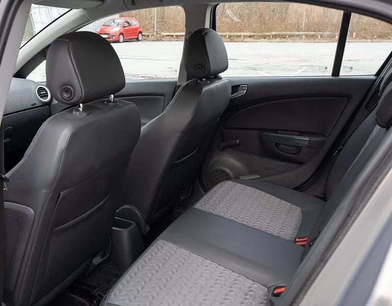 Brugt Opel Corsa 101 HK (74 kW) 2012 Brun Hatchback