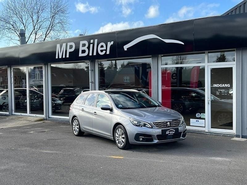 Sølvmetal Brugt 2018 Peugeot 308 Allure Sky Stationcar | 124.900 kr. (Fair pris) - Billede 1/4