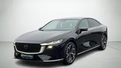 Sortmetal Ny 2025 Mazda 6e Takumi-Line Hatchback | 304.900 kr. (Fair pris)