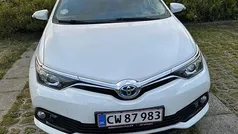 Hvid Brugt 2017 Toyota Auris Hybrid Comfort Stationcar | 114.900 kr. (Fair pris)