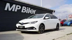 Hvid Brugt 2018 Toyota Auris Hybrid H2 Stationcar | 134.800 kr. (Fair pris)