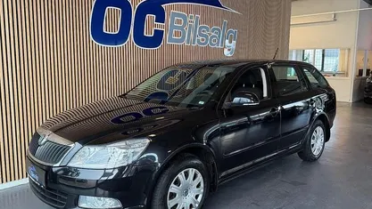 Brugt Skoda Octavia Ambiente 105 HK (77 kW) 2011 Sort Stationcar
