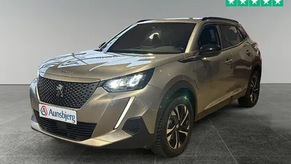Brugt Peugeot e-2008 Allure 100 kW (136 HK) 2023 Grå metal SUV