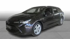Mocha brown metal Brugt 2021 Toyota Corolla H3 Smart Stationcar | 214.900 kr. (Fair pris)