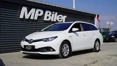 Hvid Brugt 2016 Toyota Auris Hybrid Comfort Stationcar | 109.900 kr. (Fair pris)