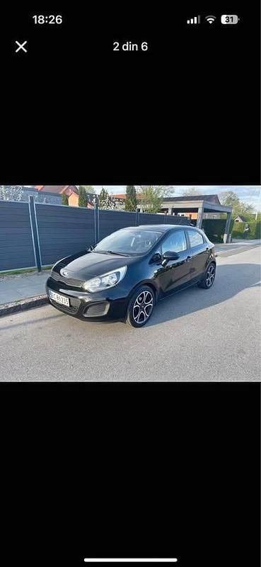 Sort Brugt 2013 Kia Rio MPV | 38.000 kr. (Fair pris) - Billede 1/4
