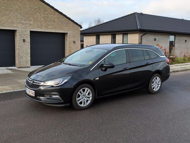 Sortmetal Brugt 2016 Opel Astra Enjoy Stationcar | 54.900 kr. (Super pris) - Billede 1/4