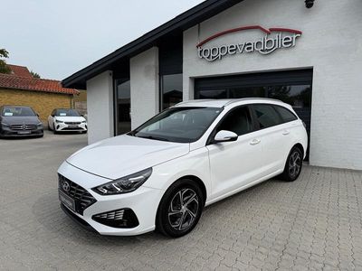 Hvid Brugt 2023 Hyundai i30 Essential Stationcar | 199.800 kr. (Fair pris)