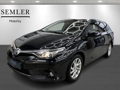 Sortmetal Brugt 2016 Toyota Auris Hybrid Comfort Stationcar | 124.900 kr. (Fair pris)