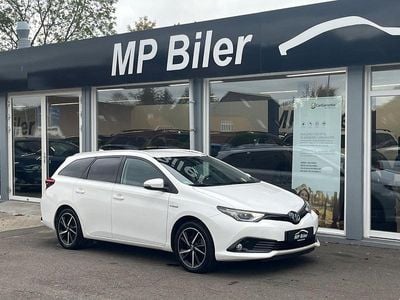 Hvid Brugt 2018 Toyota Auris Hybrid Comfort Stationcar | 129.700 kr. (Fair pris)