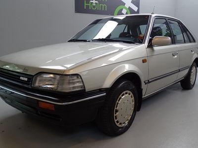 Sølv Brugt 1989 Mazda 323 | 34.700 kr.