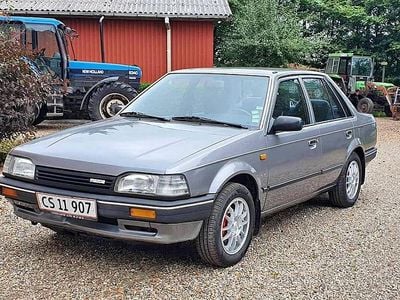 Brugt 1987 Mazda 323 Sedan | 123.456 kr.