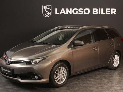 Champagnemetal Brugt 2017 Toyota Auris Hybrid Comfort Stationcar | 134.500 kr. (Fair pris)