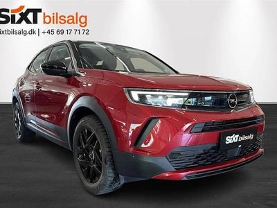 Rød/sort Brugt 2023 Opel Mokka-e Elegance SUV | 142.900 kr. (Fair pris)