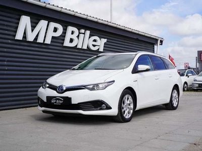 Hvid Brugt 2017 Toyota Auris Hybrid Comfort Stationcar | 114.800 kr. (Fair pris)