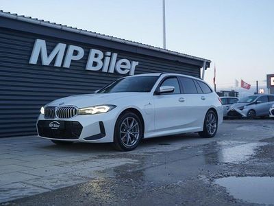 Perlemorshvid Brugt 2024 BMW 320e M Sport Stationcar | 349.700 kr. (Fair pris)