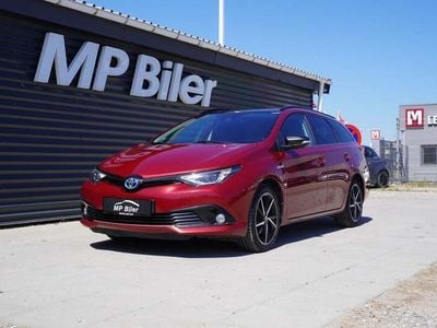 Bordeauxmetal Brugt 2017 Toyota Auris Hybrid Stationcar | 119.700 kr. (Fair pris)