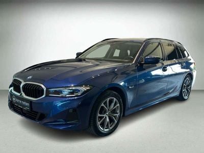 Blåmetal Brugt 2022 BMW 330e Sport Line Stationcar | 389.900 kr.