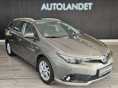 Beigemetal Brugt 2017 Toyota Auris Hybrid Comfort Stationcar | 134.800 kr. (Lidt for dyr)