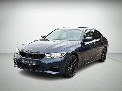 Mørkblåmetal Brugt 2021 BMW 330e M Sport Sedan | 349.900 kr. (Lidt for dyr)