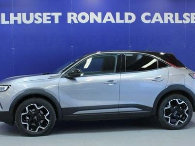 Sølvmetal Ny 2024 Opel Mokka-e Ultimate SUV | 189.900 kr.