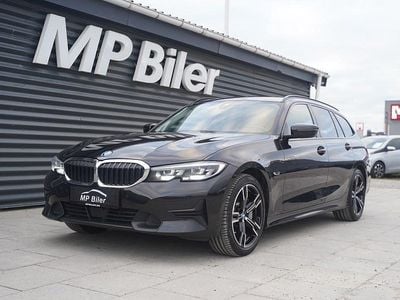 Sortmetal Brugt 2022 BMW 330e Sport Line Stationcar | 269.700 kr.
