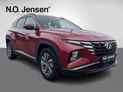 Farve ……………………………………………………………………. sunset red Brugt 2021 Hyundai Tucson Essential SUV | 234.900 kr.