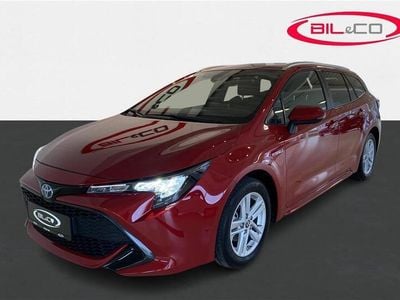 3u5 flame red Brugt 2021 Toyota Corolla Active Stationcar | 310.200 kr.