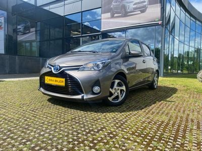 Platinum bronze Brugt 2016 Toyota Yaris Hybrid H2 Hatchback | 69.900 kr.