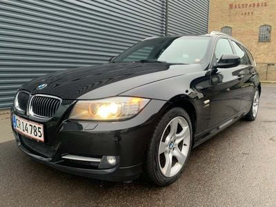 Sortmetal Brugt 2011 BMW 330 Exclusive Stationcar | 1.999 kr.