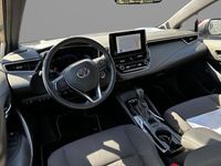 brugt Toyota Corolla 1,8 Hybrid Active Smart E-CVT 122HK 5d Trinl. Gear A++