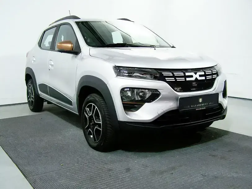 Gebraucht Dacia Spring Extreme 80 kW (110 PS) 2023 Grau (metallic) Kleinwagen
